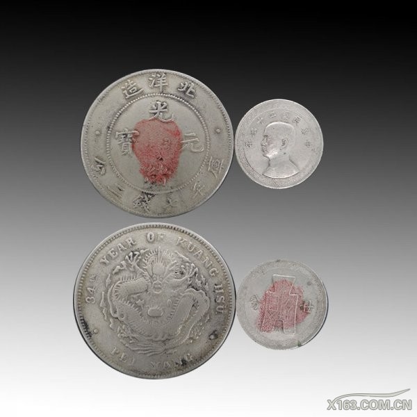 北洋造光绪元·中华民国二十七年孙小头一组；尺寸3.92cm 2.4cm；起拍价280万.jpg